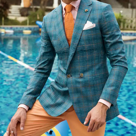 Marzoni double-breasted sport coat in a teal windowpane Italian fabric, featuring refined tailoring, vibrant color, and sophisticated styling for custom jackets and executive wardrobes.