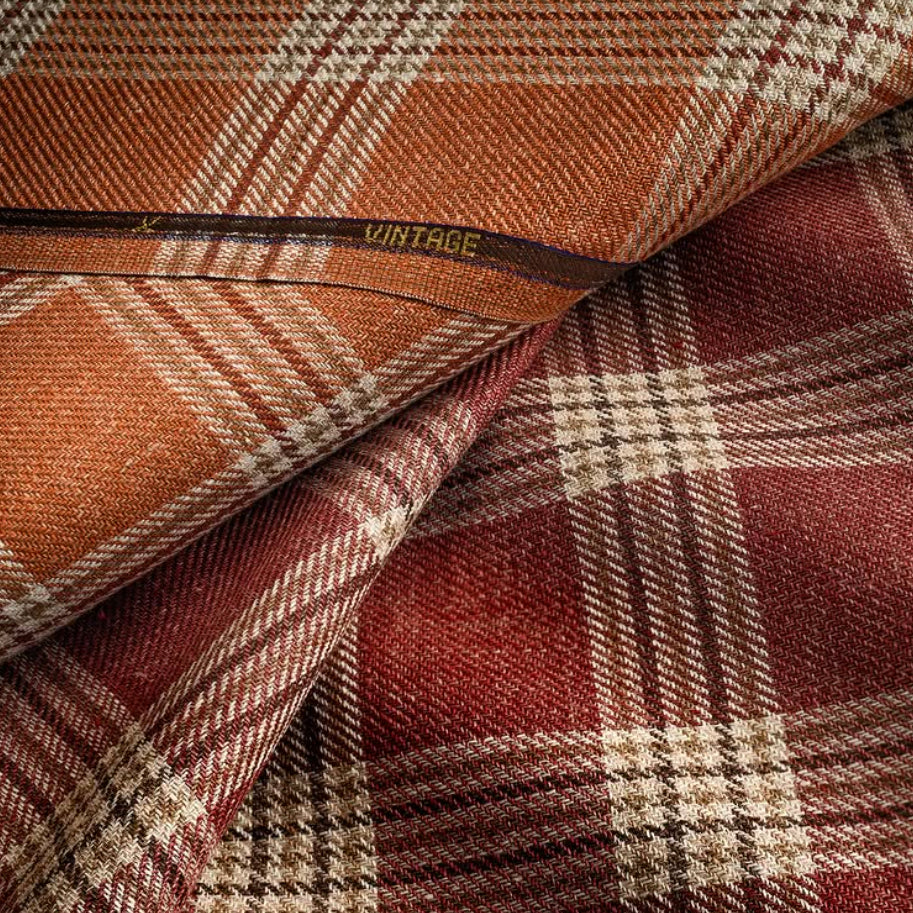 Rust and burgundy plaid wool fabrics from Vitale Barberis Canonico, showcasing rich color, classic Italian design, and exceptional textile craftsmanship.