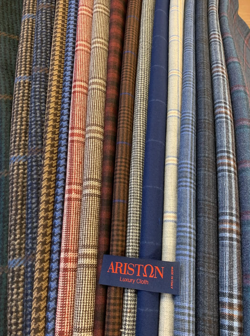 Ariston luxury Italian fabric collection featuring premium wool suiting and sport coat fabrics selected by Jeffrey Bartlett Clothiers for custom clothing.